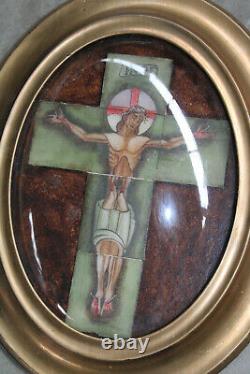 Antique French crucifix in tiles ceramic behind glass framed wall panel plaque