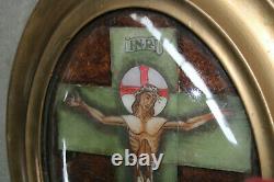 Antique French crucifix in tiles ceramic behind glass framed wall panel plaque