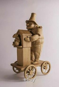 Articulated mechanical wooden toy, a figure carved from wood by hand from Russia