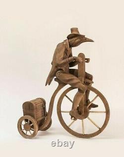 Articulated mechanical wooden toy, a figure carved from wood by hand from Russia